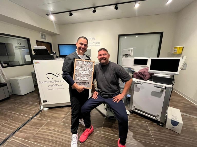 Southwest Eye Institute LASIK surgeon posing with patient in laser vision correction suite, highlighting successful LASIK results and clear vision in El Paso, Texas.