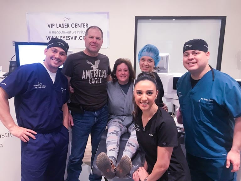 LASIK patient surrounded by Southwest Eye Institute laser vision correction team in El Paso, celebrating successful treatment and improved vision.