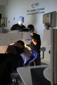 Patient during eye surgery with Javier De La Torre, MD.