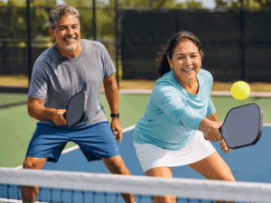 Southwest Eye Institute patients enjoying an active pickleball game while considering cataract surgery cost and treatment options.