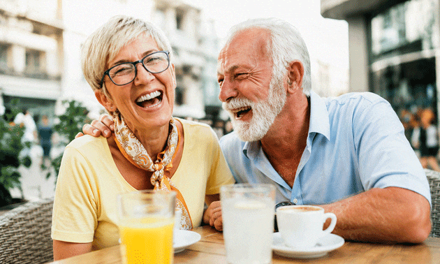 Senior couple happy at brunch after medical-based-glaucoma treatment from Southwest Eye Institute.